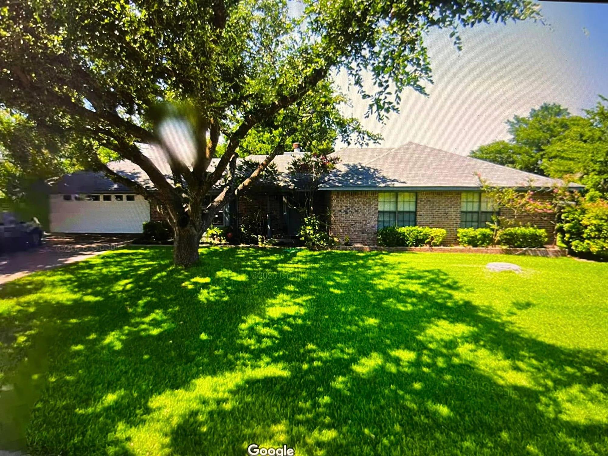Before — original exterior (via Google Street View)